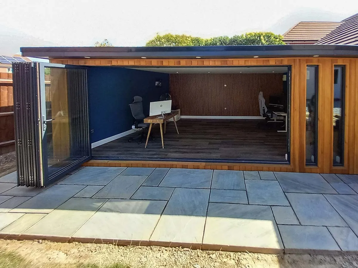 bespoke garden room in Bishops Tachbrook with large bifolding doors onto new patio